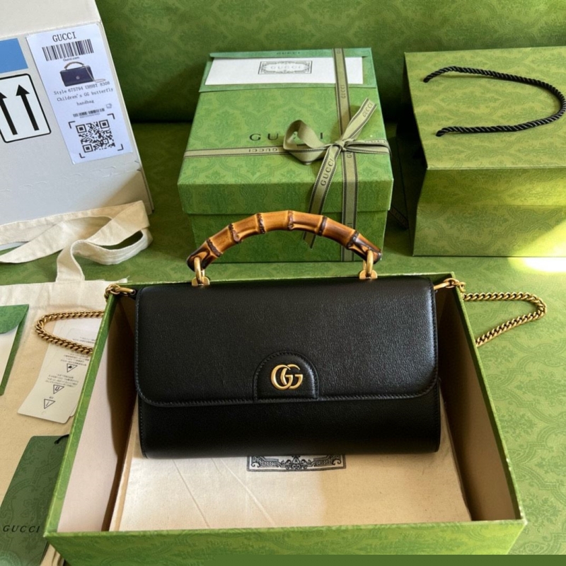 G*u*i top handle bags